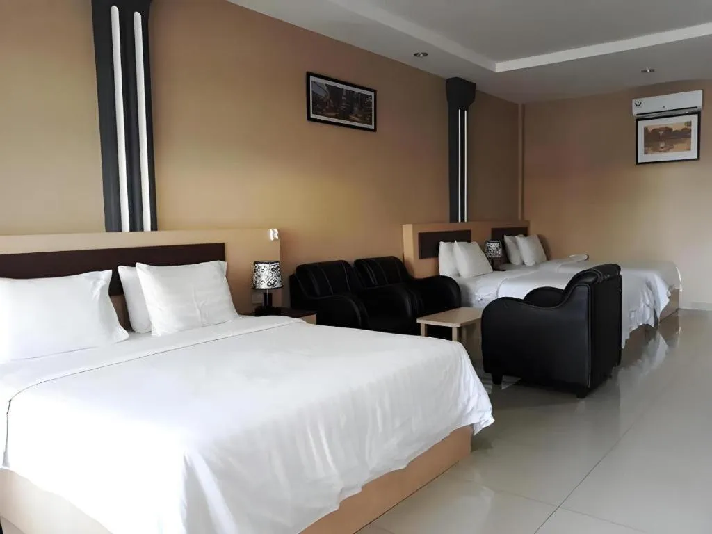 Bed in Samosir Cottages Resort