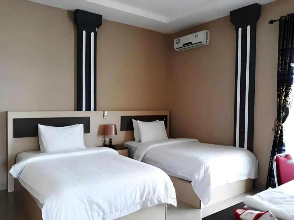 Bed in Samosir Cottages Resort