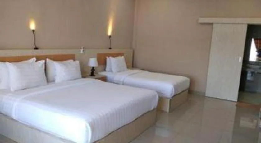 Bed in Samosir Cottages Resort