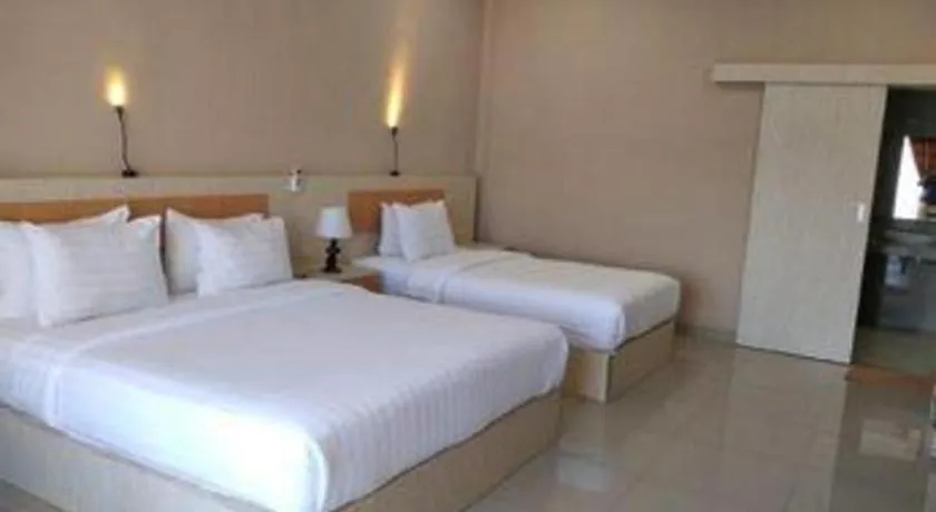 Bed in Samosir Cottages Resort