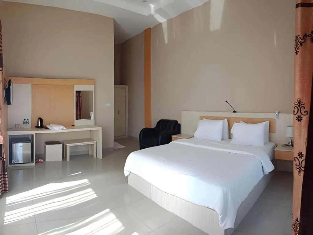 Bed in Samosir Cottages Resort