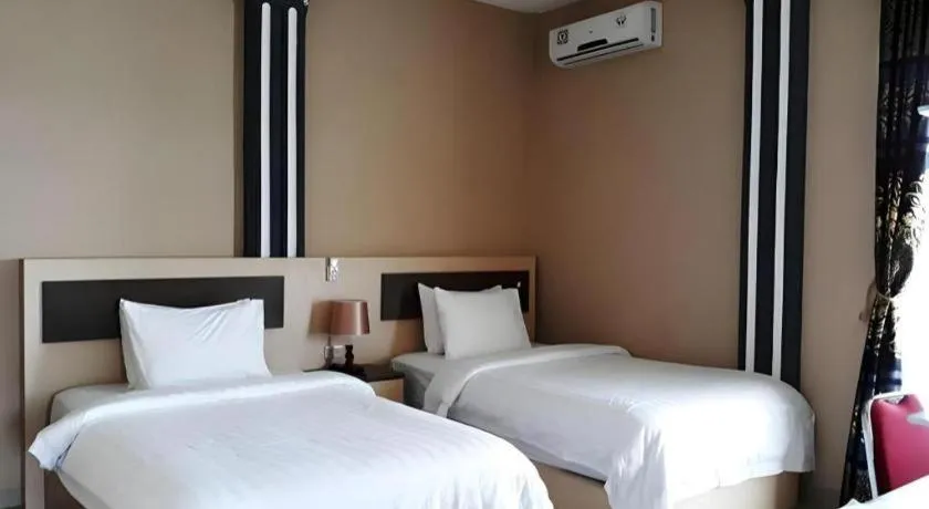 Bed in Samosir Cottages Resort