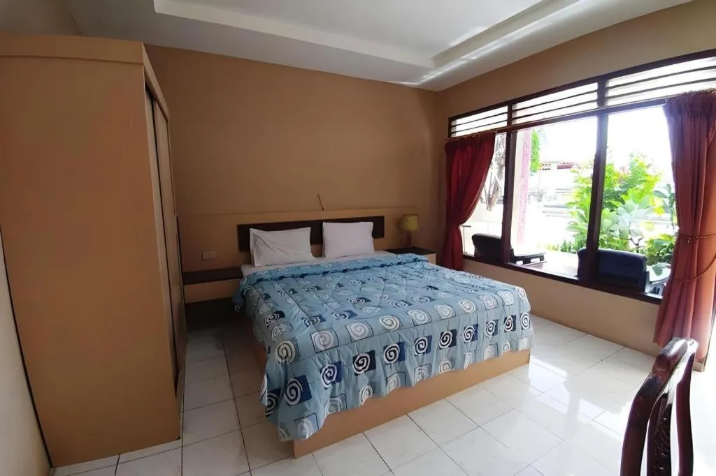 Bed in Samosir Cottages Resort