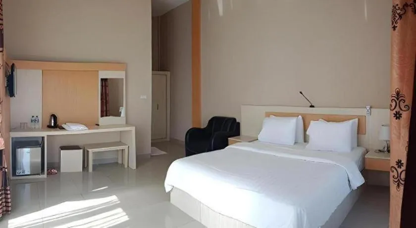 Bed in Samosir Cottages Resort