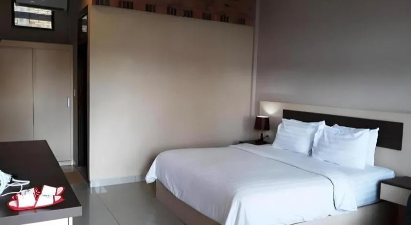 Bed in Samosir Cottages Resort