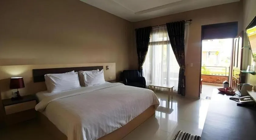 Bed in Samosir Cottages Resort