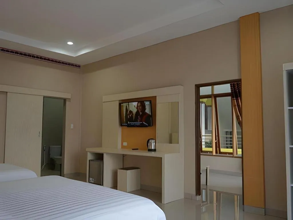 Bed in Samosir Cottages Resort