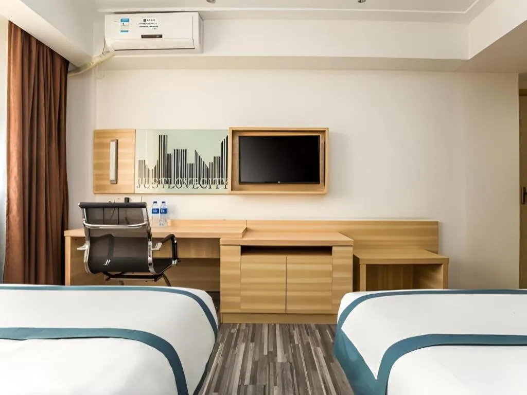 Bed in City Comfort Inn Zhaoqing Qixingyan Scenic Area Xinghu Archway