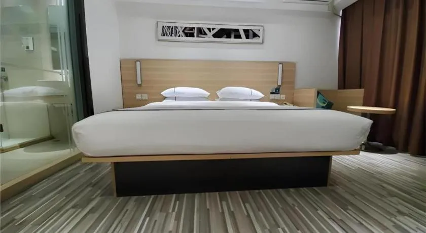 Bed in City Comfort Inn Zhaoqing Qixingyan Scenic Area Xinghu Archway