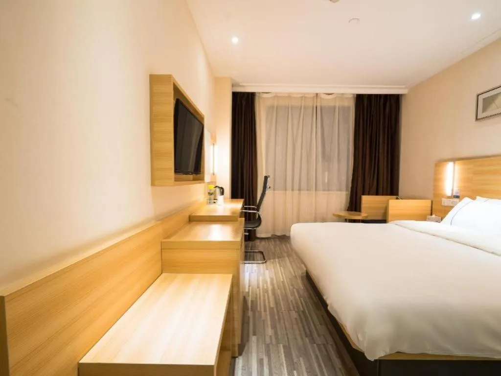 Bed in City Comfort Inn Wuhan High Speed Railway Station