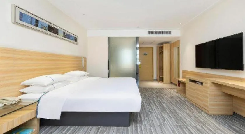 Bed in City Comfort Inn Wuhan High Speed Railway Station