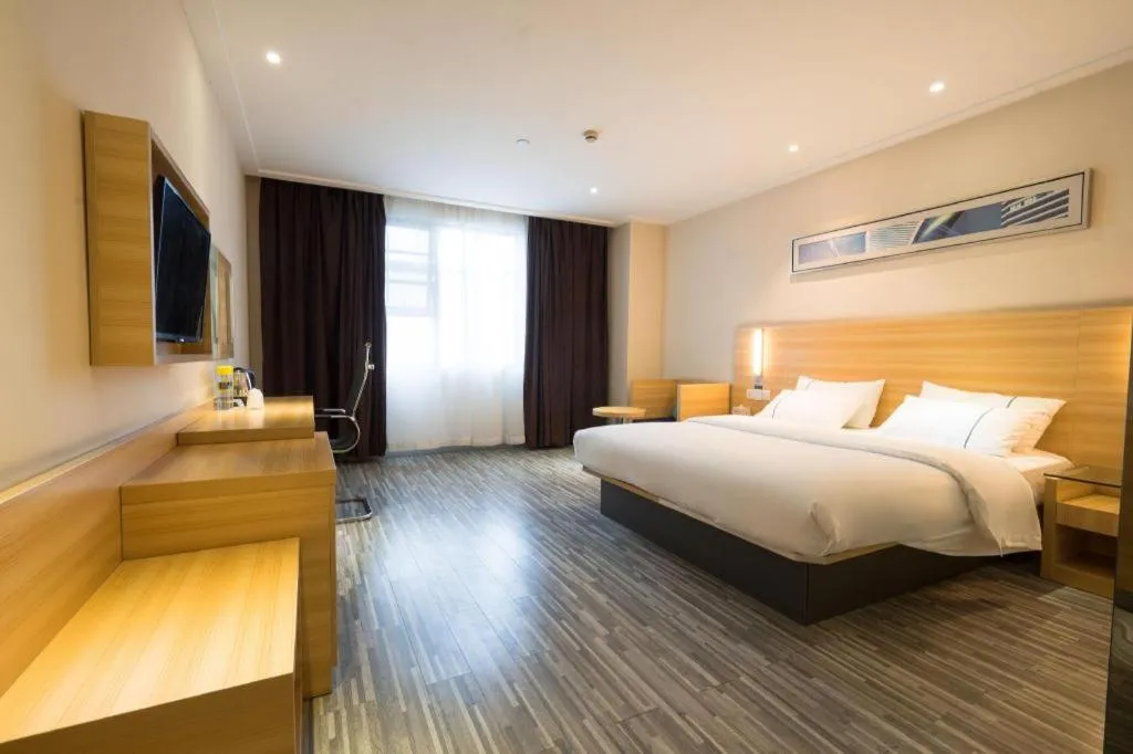 Bed in City Comfort Inn Wuhan High Speed Railway Station