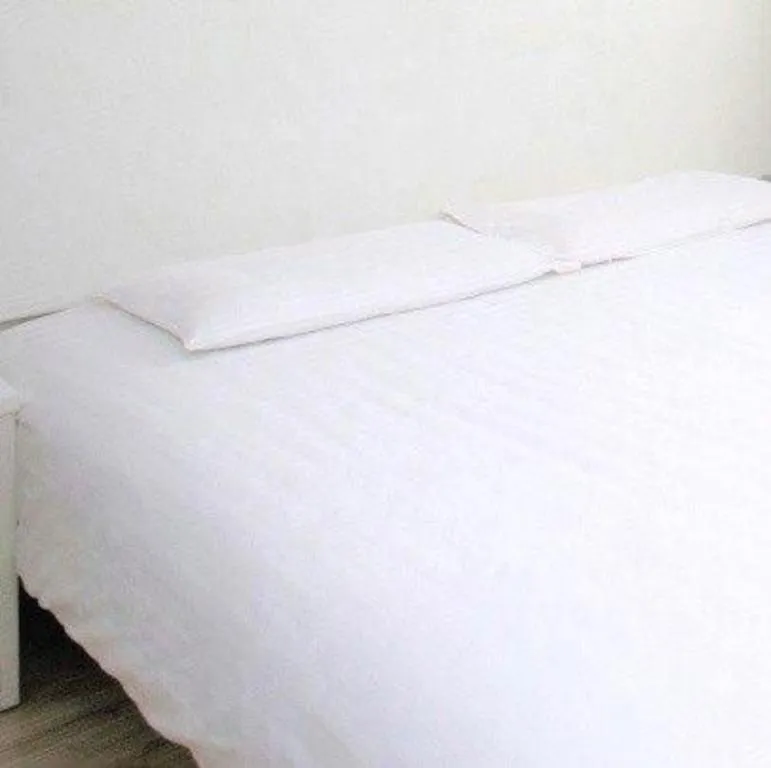 Bed in City Comfort Inn Wuhan High Speed Railway Station