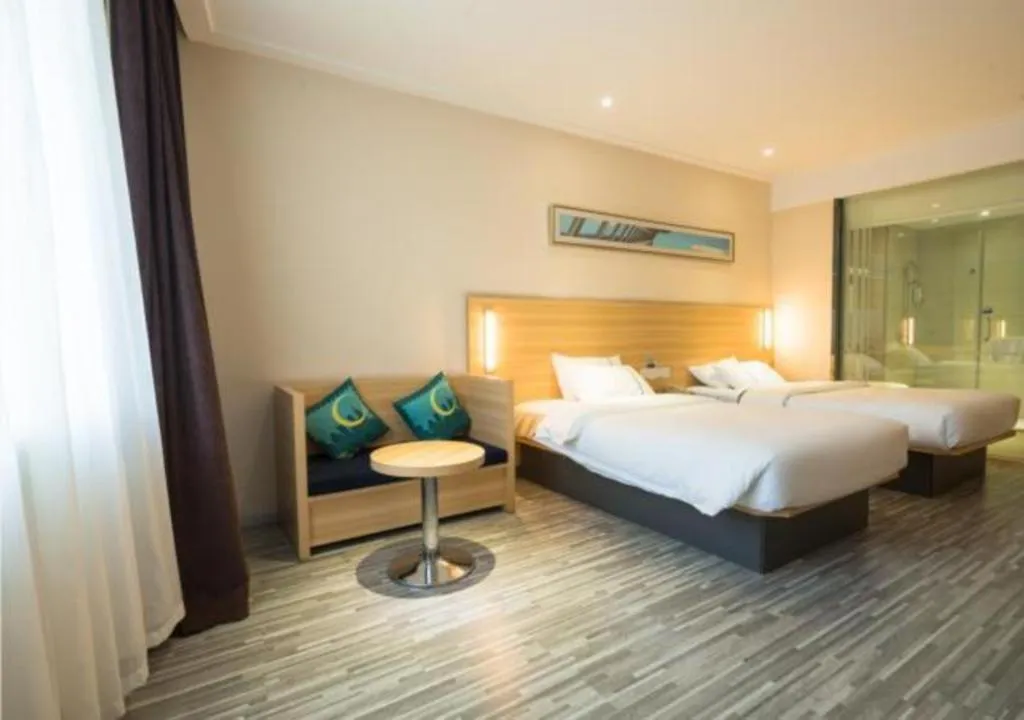 Bed in City Comfort Inn Wuhan High Speed Railway Station