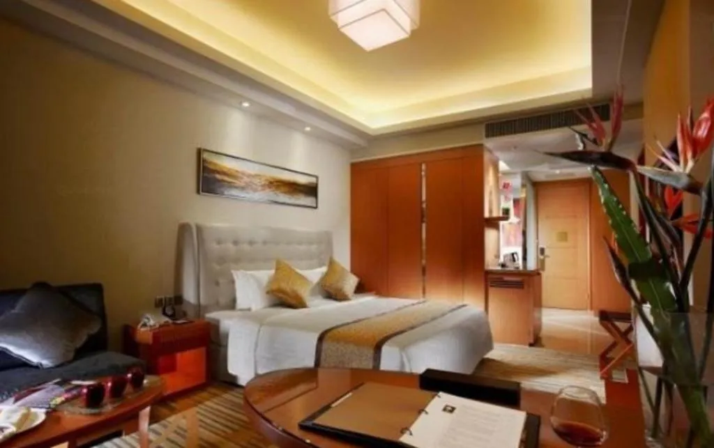 Bed in Dezhou Regal Kangbo Hotel