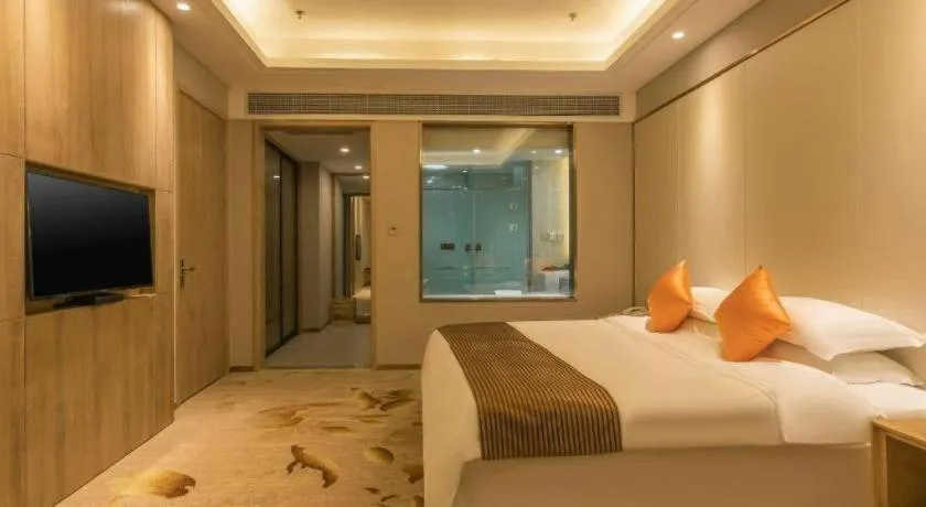 Bed in Dezhou Regal Kangbo Hotel