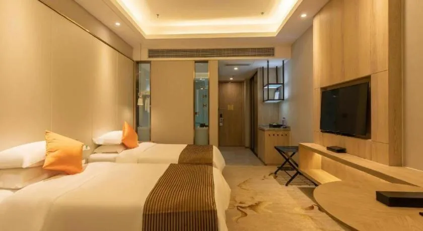 Bed in Dezhou Regal Kangbo Hotel