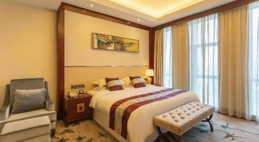 Bed in Dezhou Regal Kangbo Hotel