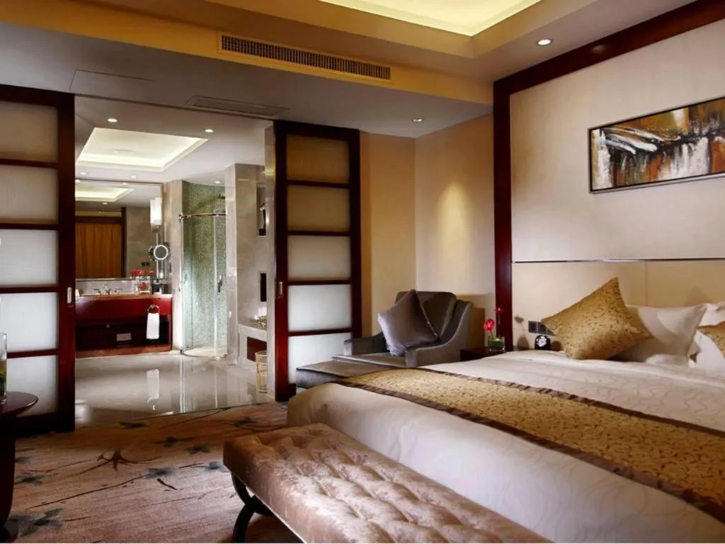 Bed in Dezhou Regal Kangbo Hotel