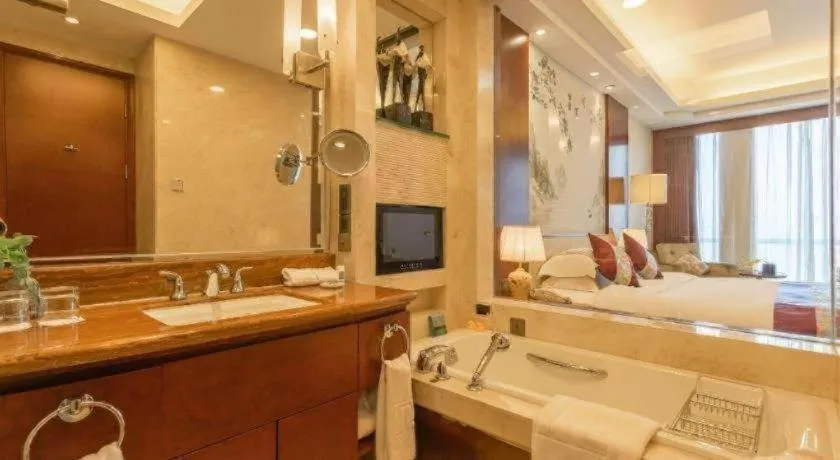 Bed in Dezhou Regal Kangbo Hotel