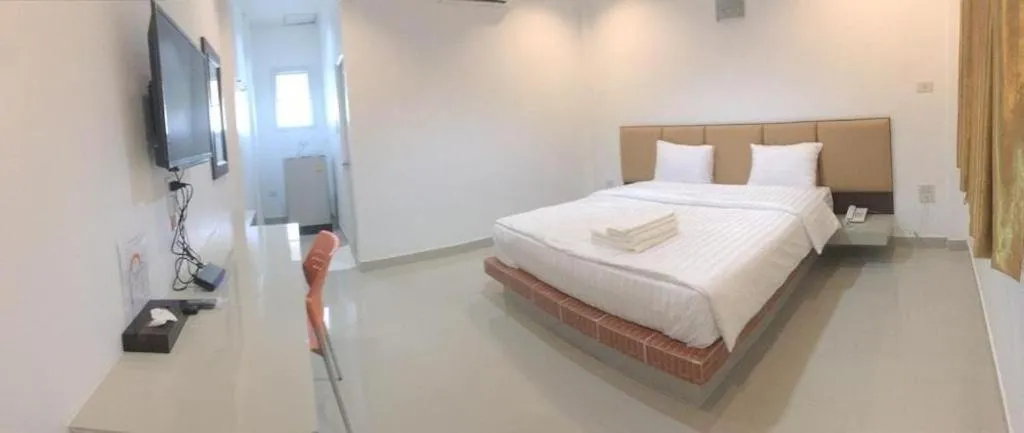 Bed in The Phant Hotel