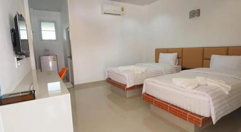 Bed in The Phant Hotel