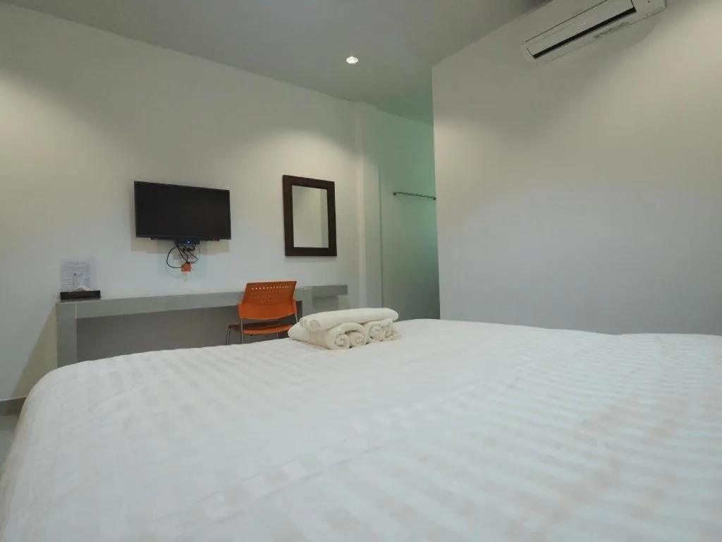 Bed in The Phant Hotel