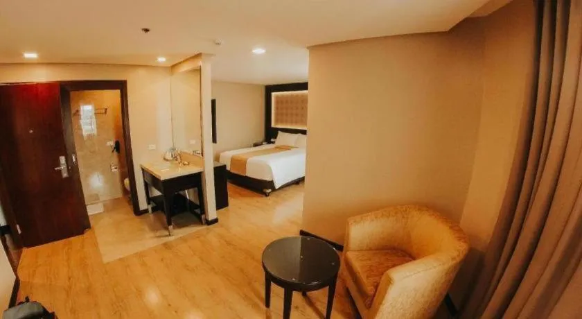 Bed in Grand Xing Imperial Hotel