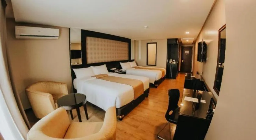 Bed in Grand Xing Imperial Hotel