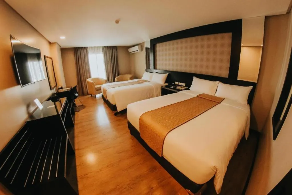 Bed in Grand Xing Imperial Hotel