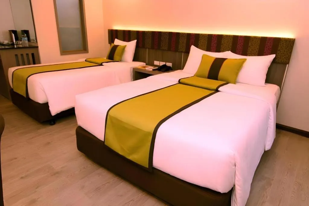 Bed in Grand Xing Imperial Hotel