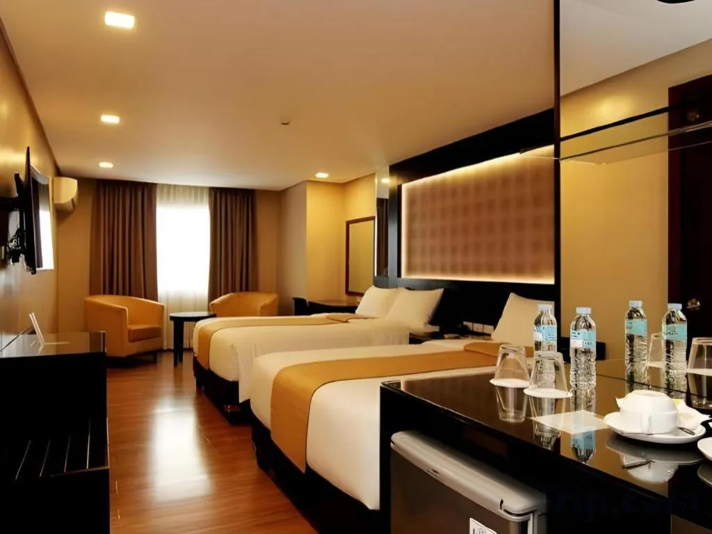 Bed in Grand Xing Imperial Hotel