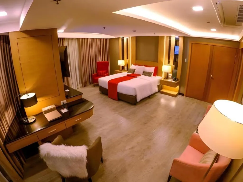 Bed in Grand Xing Imperial Hotel