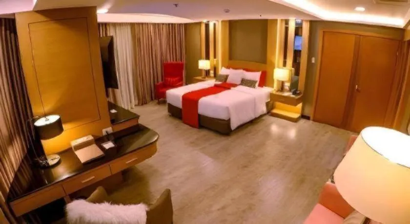 Bed in Grand Xing Imperial Hotel