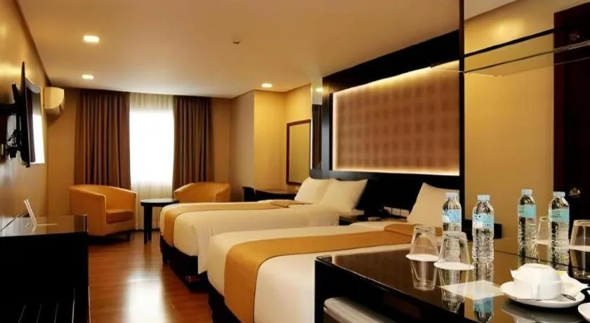 Bed in Grand Xing Imperial Hotel