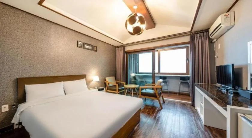 Bed in Woorim Hotel