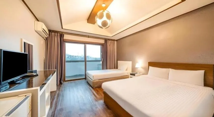 Bed in Woorim Hotel
