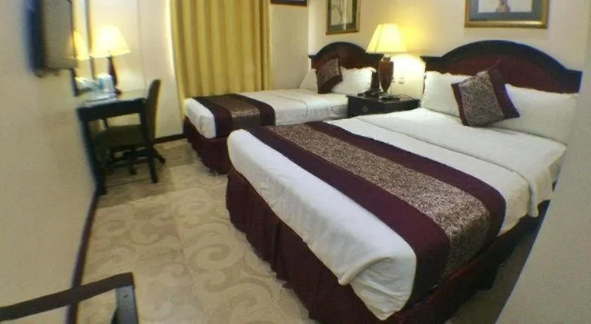 Bed in Cindy Kelly Hotel