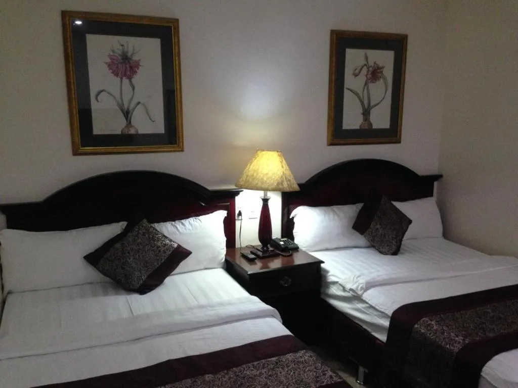 Bed in Cindy Kelly Hotel