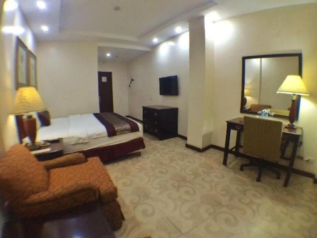 Bed in Cindy Kelly Hotel