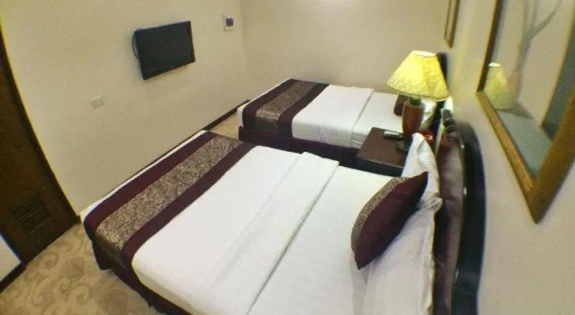 Bed in Cindy Kelly Hotel