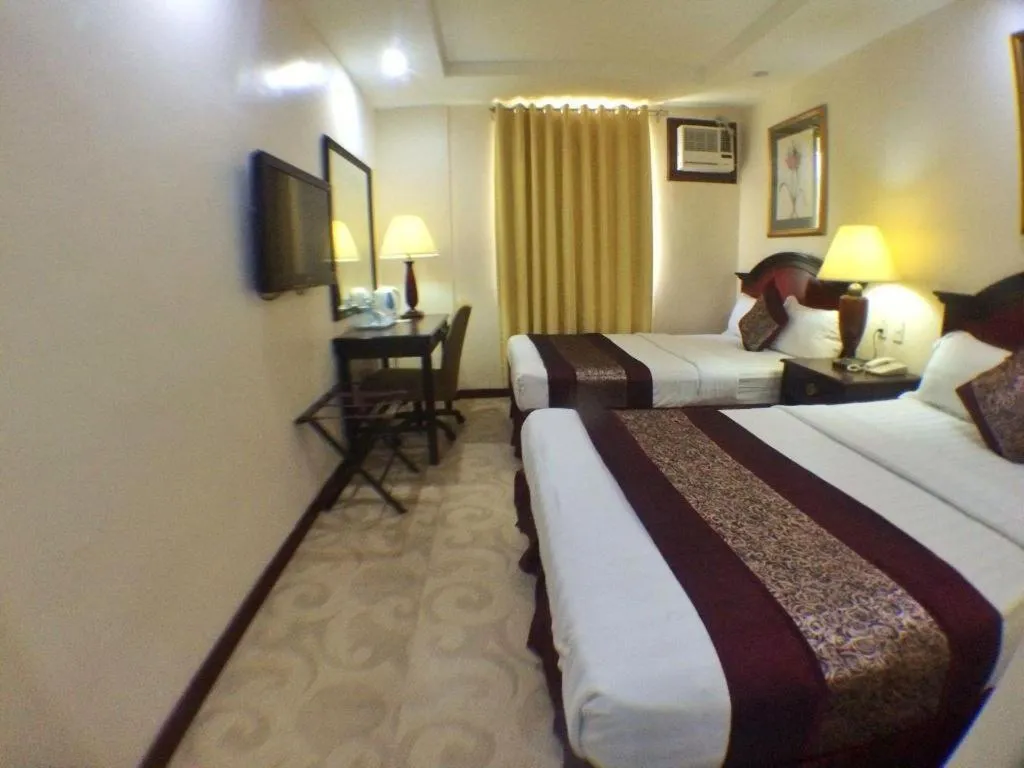 Bed in Cindy Kelly Hotel