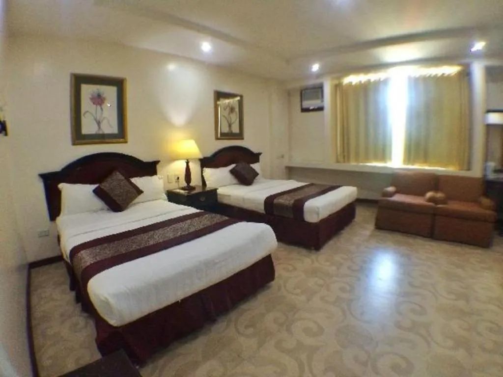 Bed in Cindy Kelly Hotel