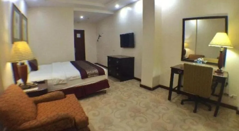 Bed in Cindy Kelly Hotel