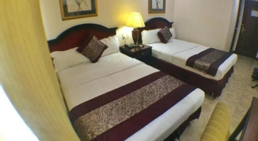 Bed in Cindy Kelly Hotel