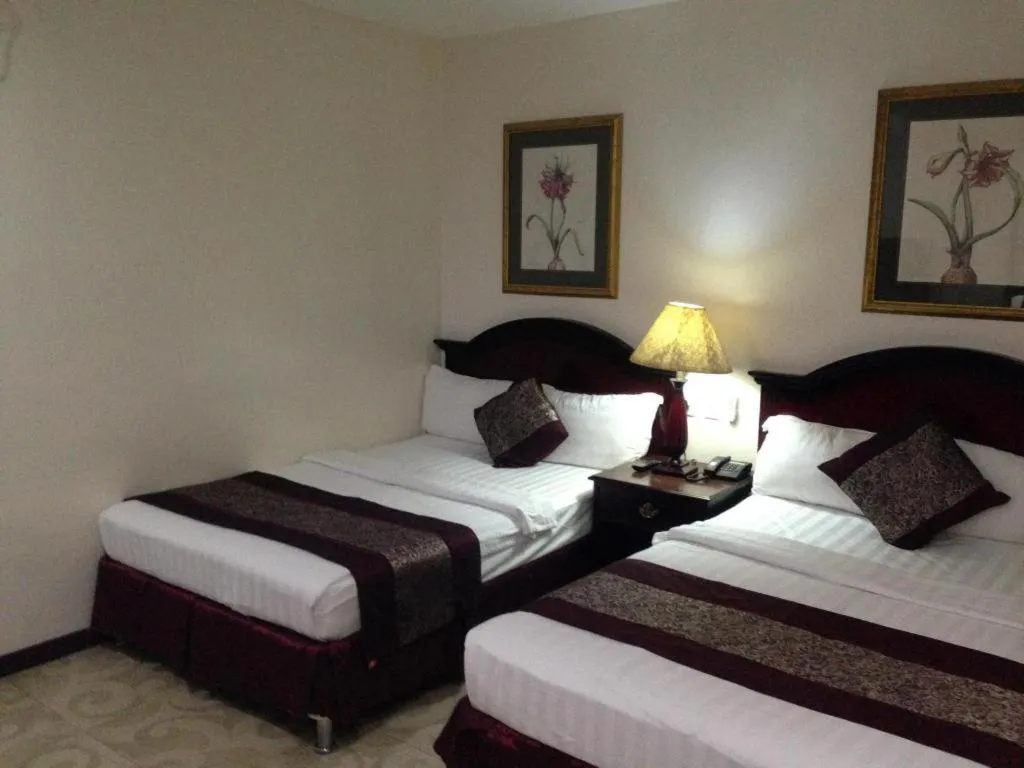 Bed in Cindy Kelly Hotel