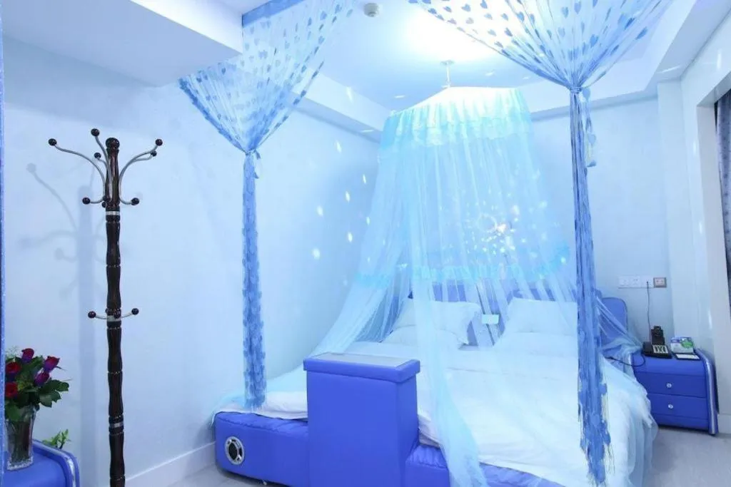 Bed in Borrman Hotel Guangzhou Tianhe Tangdong Subway Station Convention and Exhibition Center