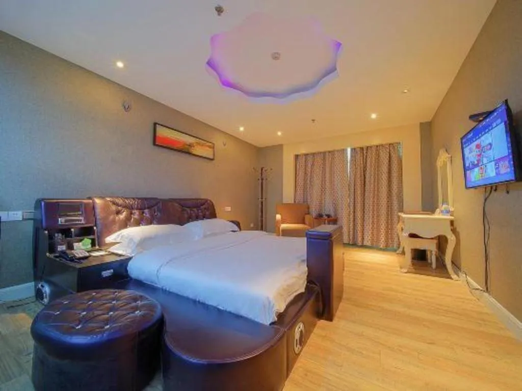 Bed in Borrman Hotel Guangzhou Tianhe Tangdong Subway Station Convention and Exhibition Center