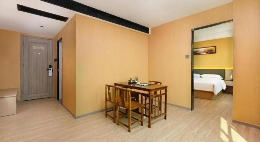 Bed in Borrman Hotel Guangzhou Tianhe Tangdong Subway Station Convention and Exhibition Center