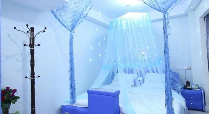 Bed in Borrman Hotel Guangzhou Tianhe Tangdong Subway Station Convention and Exhibition Center